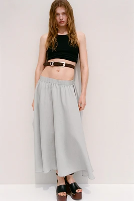 JUPE MIDI FLUIDE VOLUME