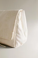 QUILTED EMBROIDERED TOILETRY BAG