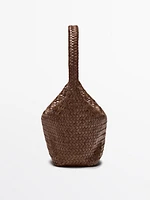 Sac seau tressé en cuir nappa