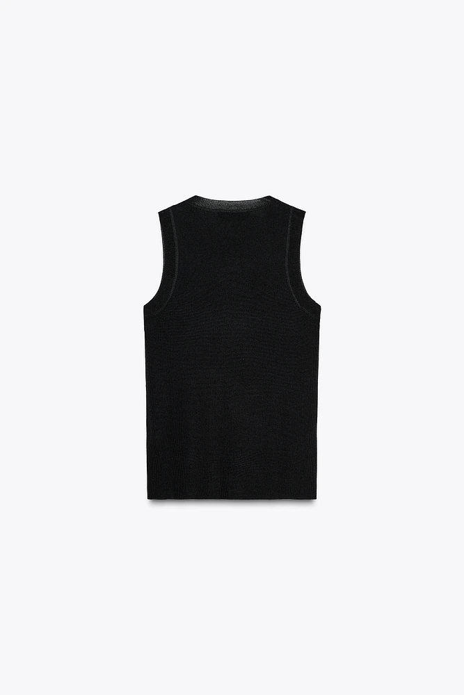 TOP EN MAILLE UNI SANS MANCHES