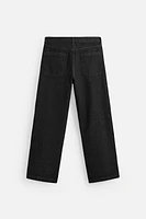 RELAXED FIT FRAYED SEAM JEANS