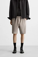 BERMUDA DE JOGGING OVERSIZE TECHNIQUE