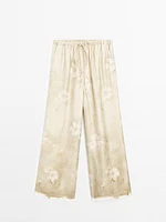 Flowing printed trousers with drawstring detail