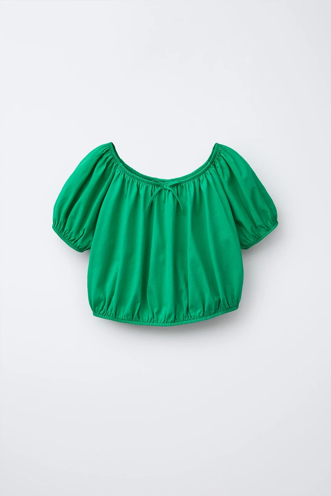 COMBINED ELASTICIZED TOP