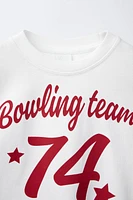 T-SHIRT À INSCRIPTION ET NUMÉRO