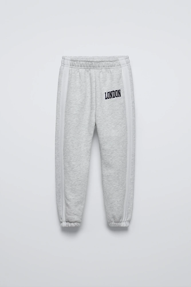 FLOCKED TEXT JOGGING PANTS