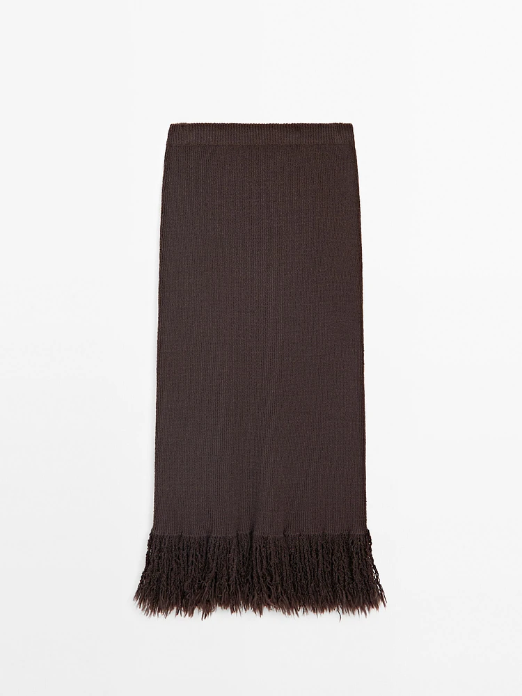Long knit skirt with fringed hem