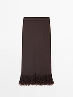 Long knit skirt with fringed hem