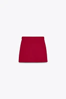 BELTED KNIT MINI SKIRT