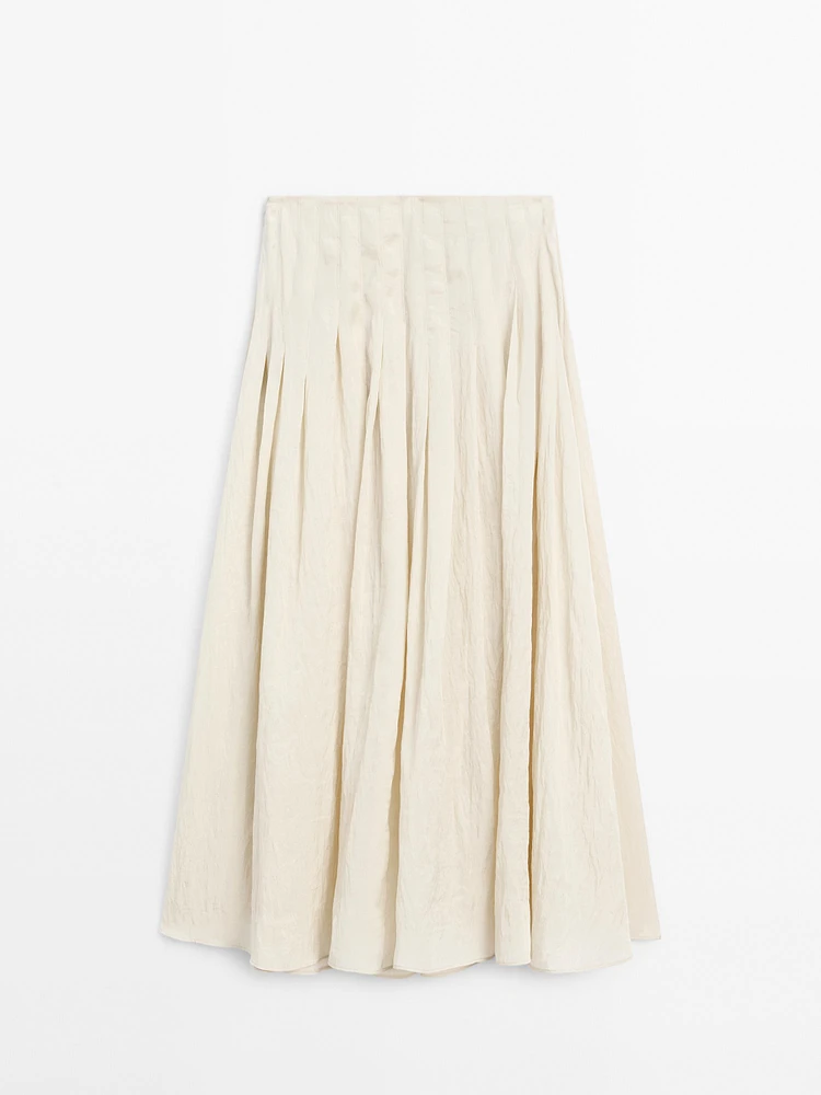 Flowing midi skirt with box pleats