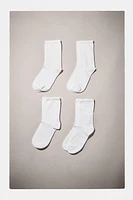 LOT DE QUATRE CHAUSSETTES LONGUES