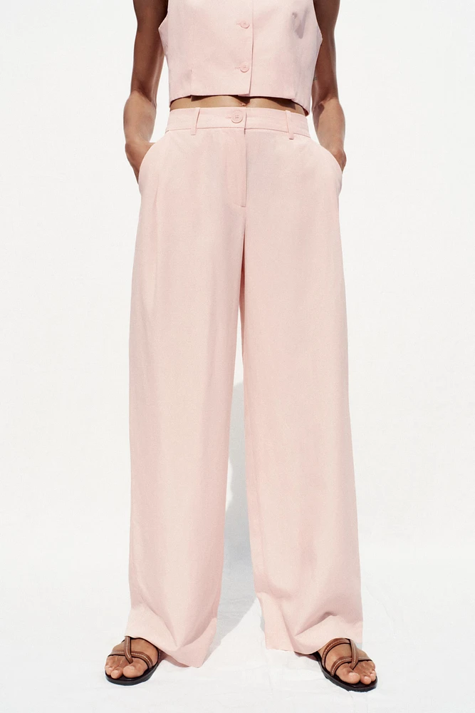 PANTALON LARGE À PINCES