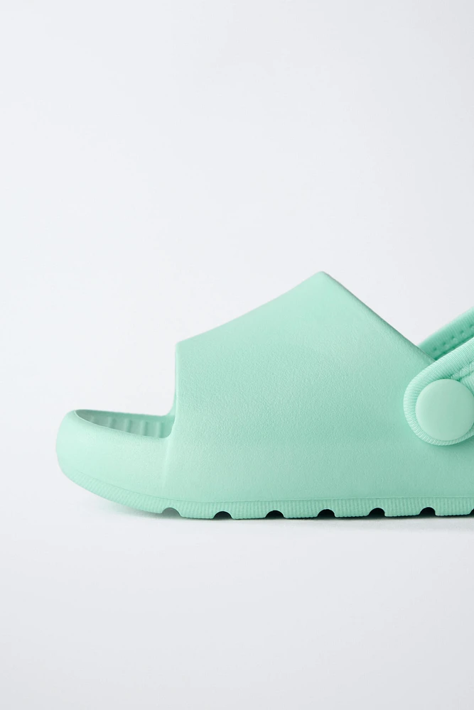 RUBBERIZED SLIDES