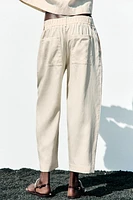 PANTALON À PINCES ET TAILLE ÉLASTIQUE