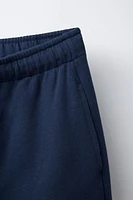SURF PRINT PLUSH SHORTS