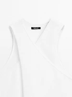 Top en maille de coton à encolure américaine croisée