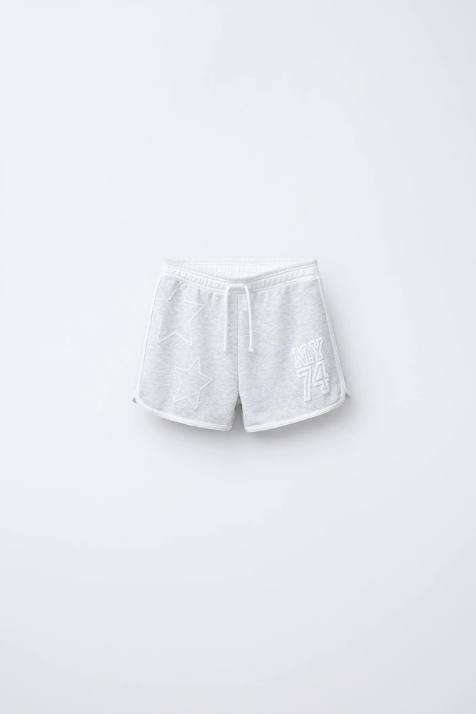 PLUSH VARSITY BERMUDA SHORTS