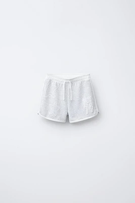 PLUSH VARSITY BERMUDA SHORTS