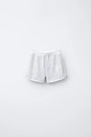 PLUSH VARSITY BERMUDA SHORTS