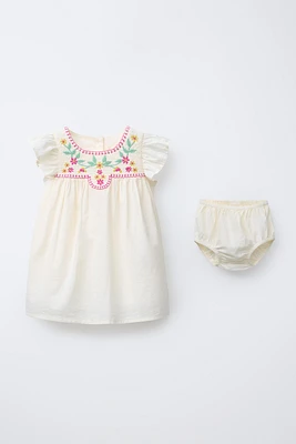 DRESS AND BLOOMERS WITH EMBROIDERED FLORAL DETAIL