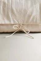 QUILTED EMBROIDERED TOILETRY BAG