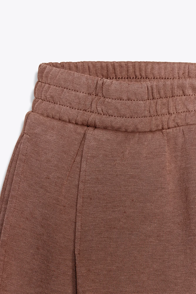 WASHED PLEATED PANTS