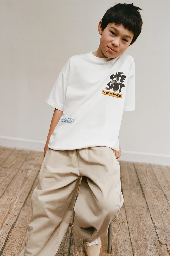 T-SHIRT À IMPRIMÉ GRAFFITI