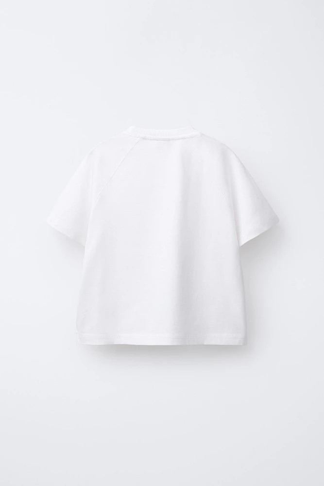 T-SHIRT À MANCHES RAGLAN IMPRIMÉ