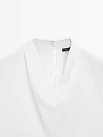 Blouse fluide à col drapé
