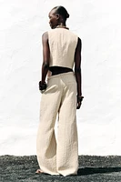 STRIPED PANTS WITH BRAIDED BELT