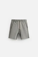 BERMUDA RELAXED FIT DÉLAVÉ
