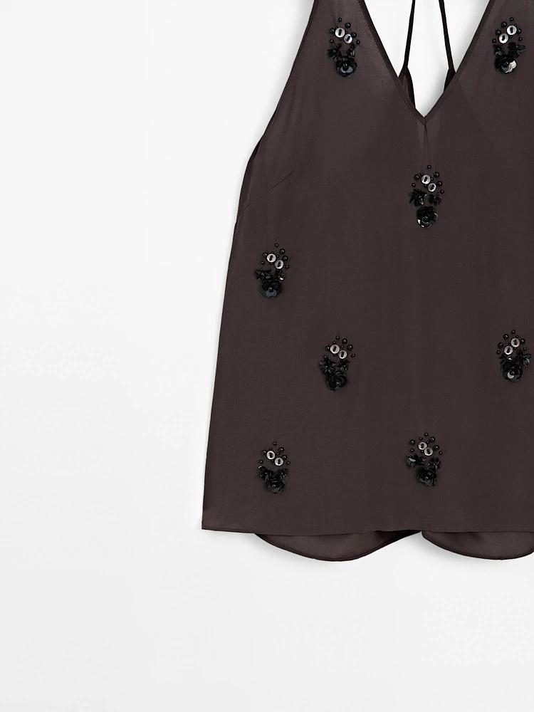 Top fluide à fleurs appliquées