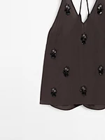 Top fluide à fleurs appliquées