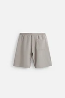 BERMUDA DE JOGGING OVERSIZE TECHNIQUE