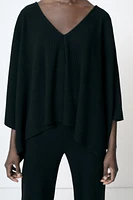 ASYMMETRIC RIBBED CAPE