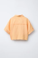 CHEMISE À NŒUD CONTENANT DU LIN