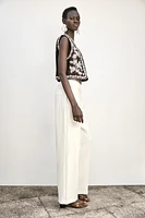 EMBROIDERED OPEN VEST
