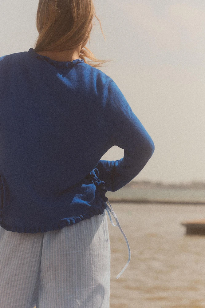 GILET EN MAILLE À VOLANTS