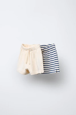 LOT DE DEUX BERMUDAS UNIES ET À RAYURES