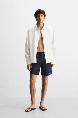 MAILLOT DE BAIN LONG À BANDES CARREAUX