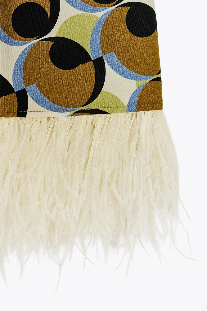 ROBE COURTE IMPRIMÉE GÉOMÉTRIQUE PLUMES