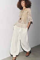 TEXTURED CROCHET KNIT TOP
