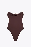 BANDEAU SWIMSUIT WITH METAL DETAIL