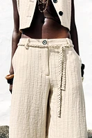 STRIPED PANTS WITH BRAIDED BELT