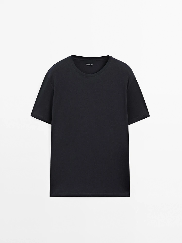 Short sleeve pyjama top and striped trousers