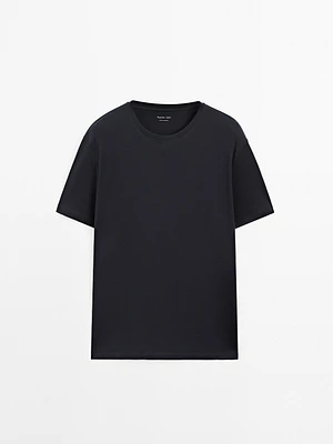 Short sleeve pyjama top and striped trousers