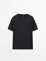 Short sleeve pyjama top and striped trousers