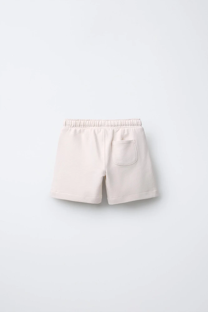 EMBROIDERED LOGO PLUSH SHORTS