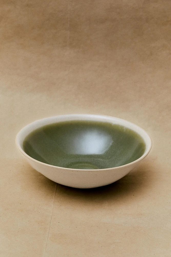 GREEN AND BEIGE STONEWARE BOWL