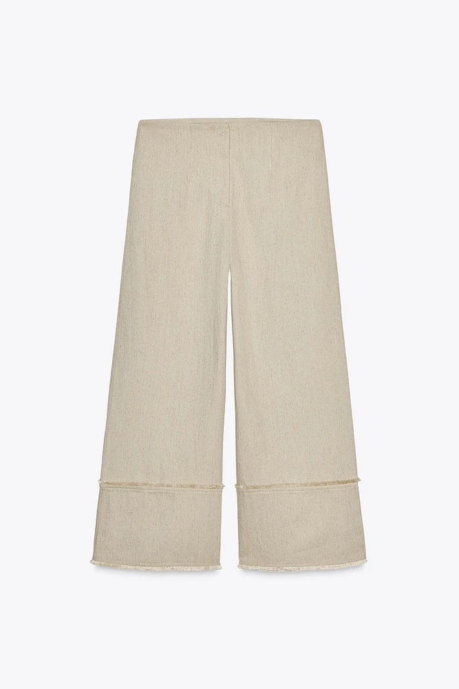 PANTALON RUSTIQUE EFFRANGÉ